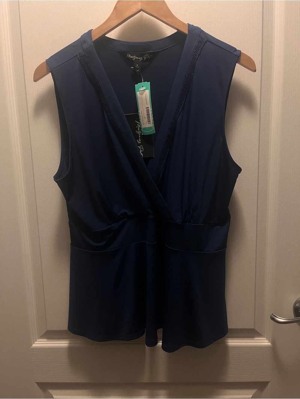 Navy Peplum Sleeveless Top